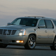 Illustration for article titled 1,000-HP Twin-Turbo Escalade beats Nissan GT-R